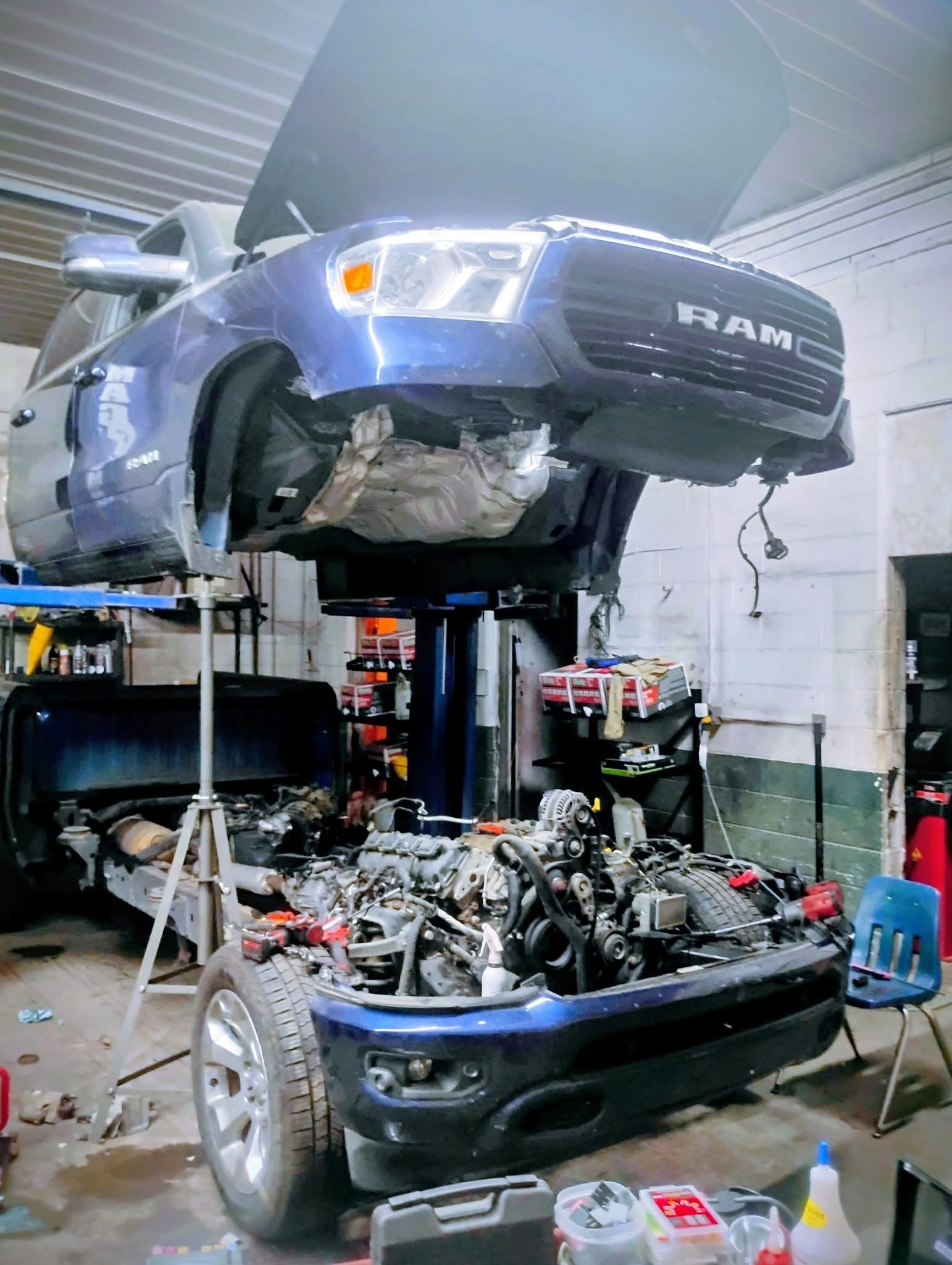 Vehicle being serviced in an Embry's Auto Repair service bay